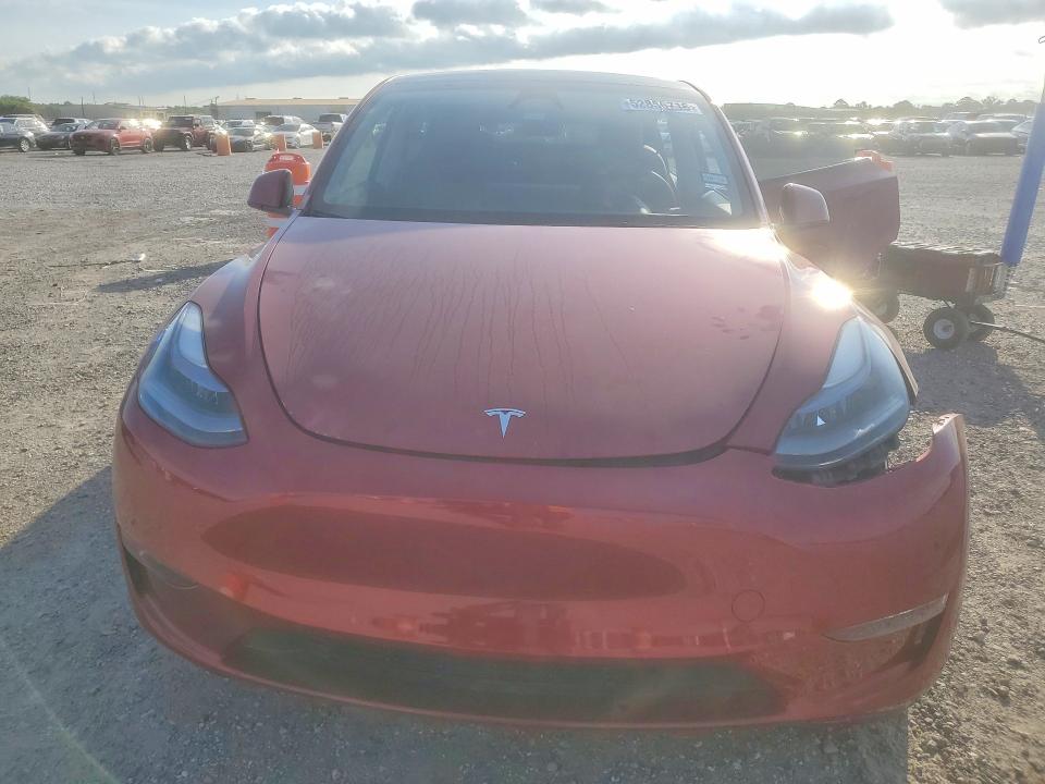 2024 Tesla Model y VIN 7SAYGDEF7RA313080 COPART salvage auction — SIDE, Tx - Salvage Vehicle Title, sold $11,600 on 2026-07-13 (photo 5)