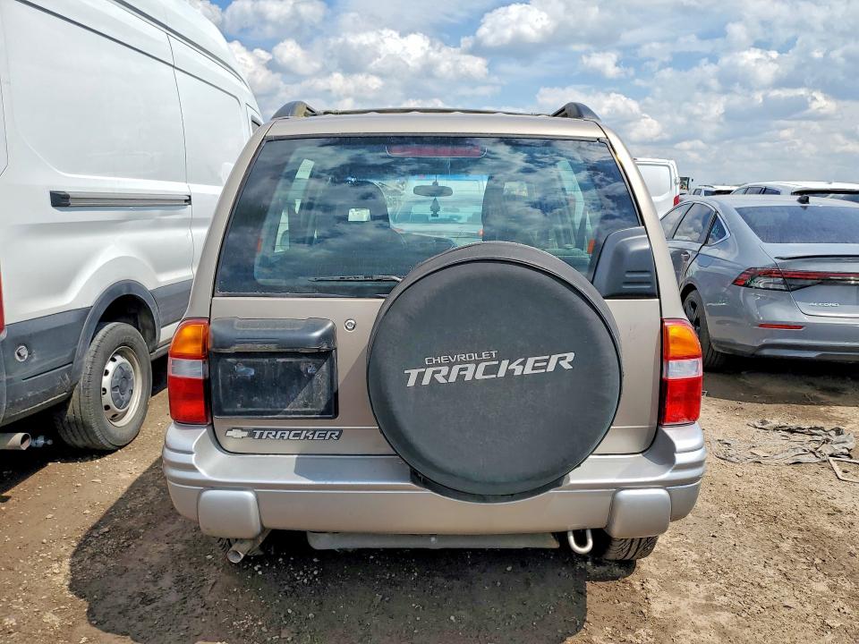 2002 Chevrolet Tracker VIN 2CNBJ634426925409 COPART salvage auction — NORMAL WEAR, Il - Certificate Of Title, sold $500 on 2026-07-02 (photo 6)