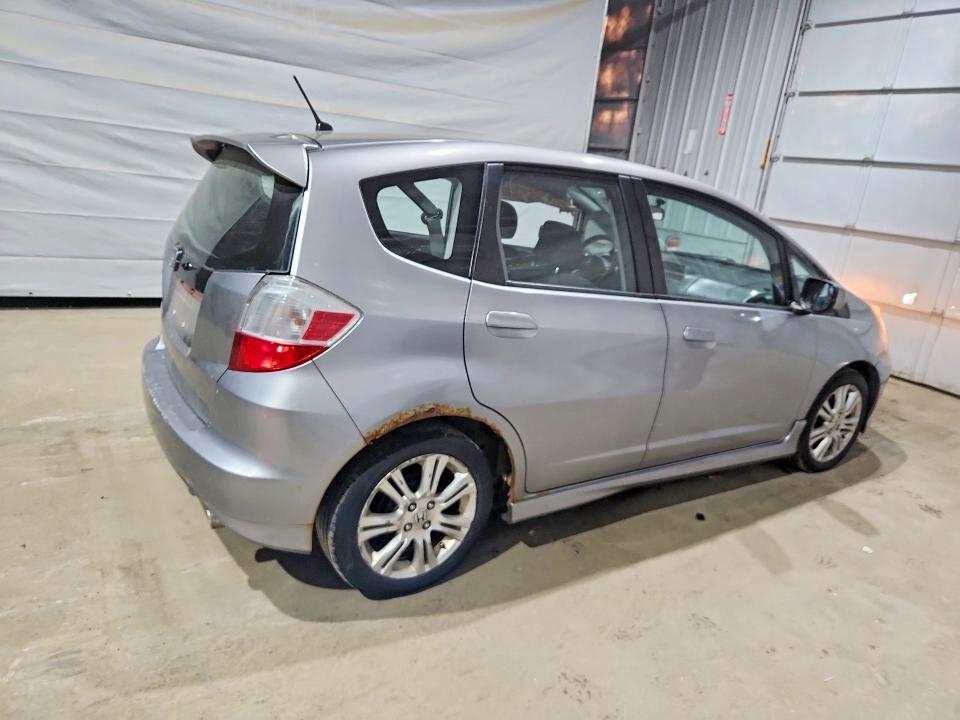 2009 Honda Fit VIN JHMGE88459S029435 COPART salvage auction — SIDE, Nh - Cert Of Title-Salvage, sold $100 on 2026-07-28 (photo 3)