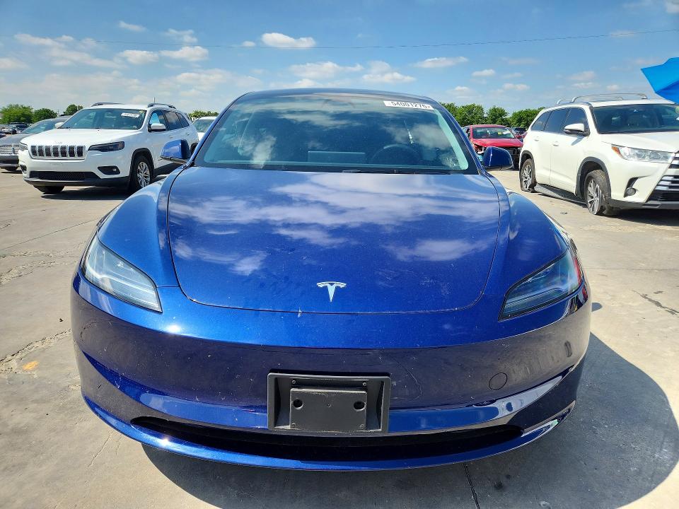 2025 Tesla Model 3 VIN 5YJ3E1EB4SF015393 COPART salvage auction — SIDE, Tx - Salvage Vehicle Title, sold $12,100 on 2026-07-13 (photo 5)