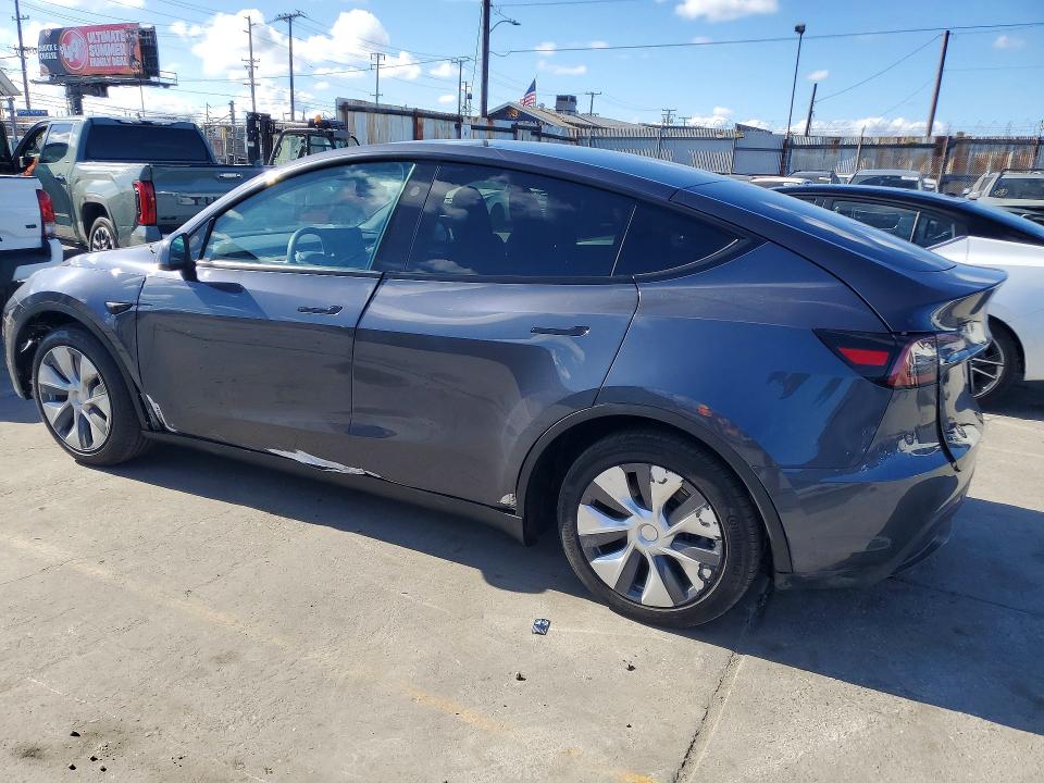 2023 Tesla Model y VIN 7SAYGDED3PF941314 COPART salvage auction — SIDE, Ca - Salvage Certificate, sold $12,600 on 2026-07-29 (photo 2)