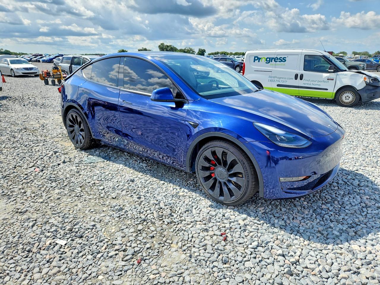 2022 Tesla Model Y VIN 7SAYGDEF3NF372818 COPART salvage auction — Rear End, FL - CERT OF TITLE SLVG REBUILDABLE, sold $12,500 on 2026-07-03 (photo 4)