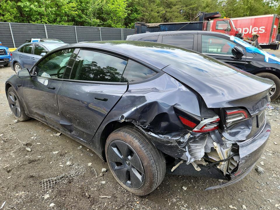 2023 Tesla Model 3 VIN 5YJ3E1EA6PF668533 COPART salvage auction — REAR END, Md - Cert Of Salvage > 75% Damage, sold $5,100 on 2026-07-14 (photo 2)