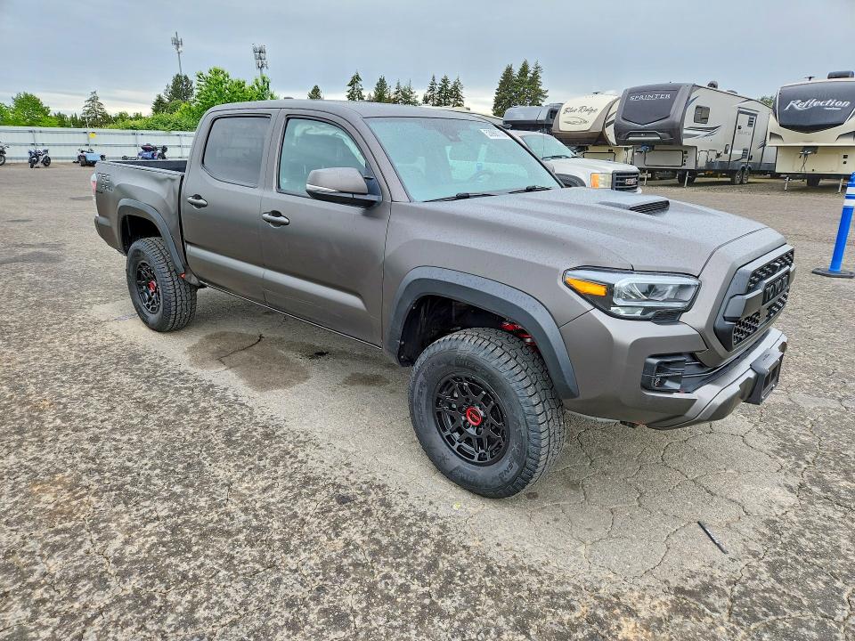 2023 Toyota Tacoma VIN 3TYCZ5AN4PT113195 COPART salvage auction — SIDE, Or - Salvage Title Certificate, sold $23,600 on 2026-07-20 (photo 4)