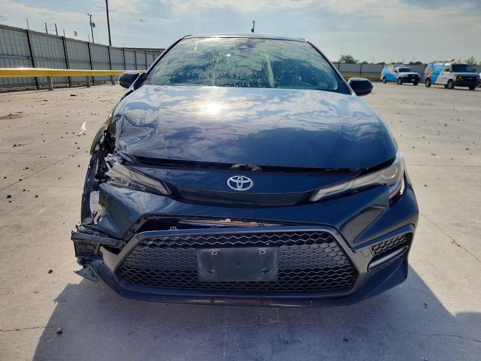 2021 Toyota Corolla VIN JTDS4MCEXMJ055857 COPART salvage auction — FRONT END, TX - SALVAGE VEHICLE TITLE (P), sold $4,900 on 2026-07-17 (photo 5)