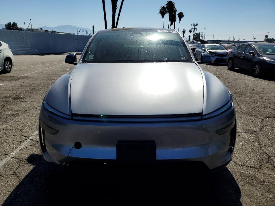2026 Tesla Model y VIN 7SAYGDED7TF416136 COPART salvage auction — SIDE, Ca - Salvage Certificate, sold $18,000 on 2026-07-17 (photo 5)