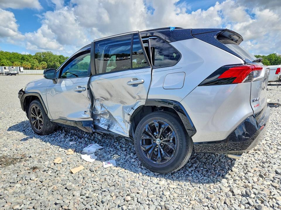 2023 Toyota Rav 4 VIN JTME6RFV6PJ031902 COPART salvage auction — SIDE, Fl - Cert Of Title Slvg Rebuildable, sold $13,500 on 2026-07-08 (photo 2)