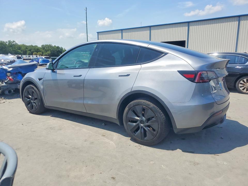 2024 Tesla Model y VIN 7SAYGDEEXRA320838 COPART salvage auction — MINOR DENT/SCRATCHES, Tx - Certificate Of Title (P), sold $20,600 on 2026-07-13 (photo 2)