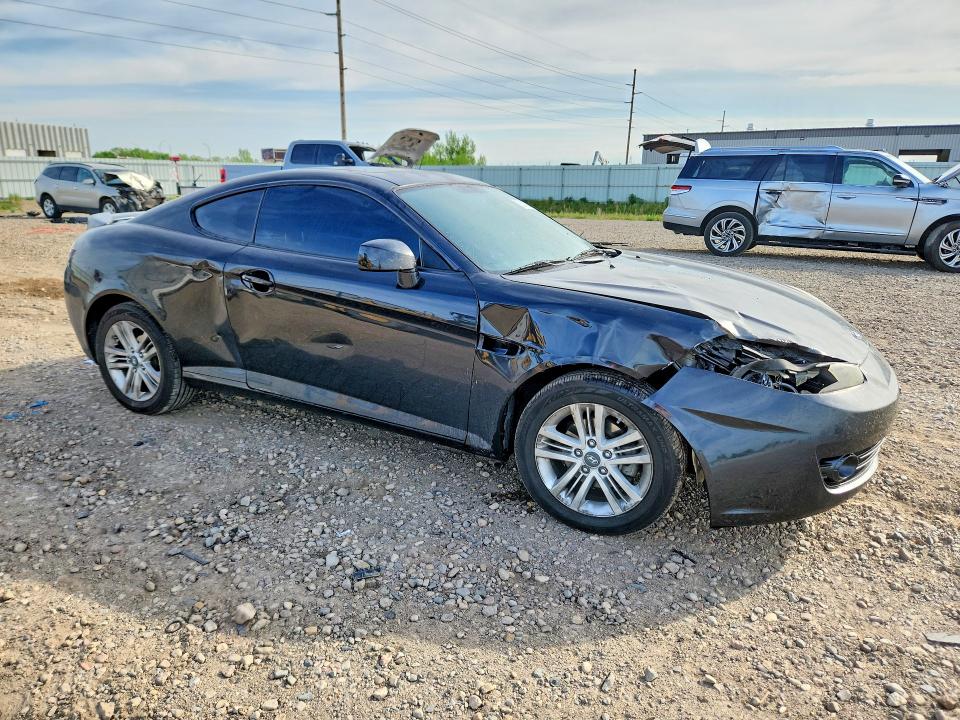 2007 Hyundai Tiburon VIN KMHHM66D27U251718 COPART salvage auction — FRONT END, Mn - Cert Of Title-Prior Salvage, sold $100 on 2026-07-06 (photo 4)