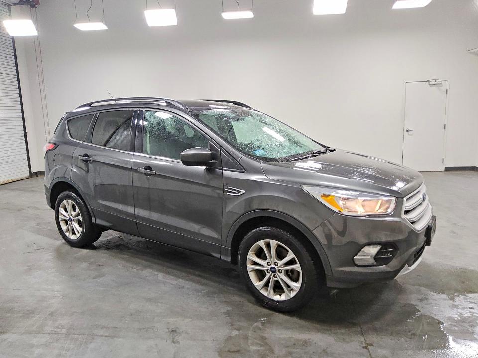 2018 Ford Escape VIN 1FMCU9GD1JUC10675 COPART salvage auction — MINOR DENT/SCRATCHES, MA - CERTIFICATE OF TITLE, sold $1,500 on 2026-07-09 (photo 4)