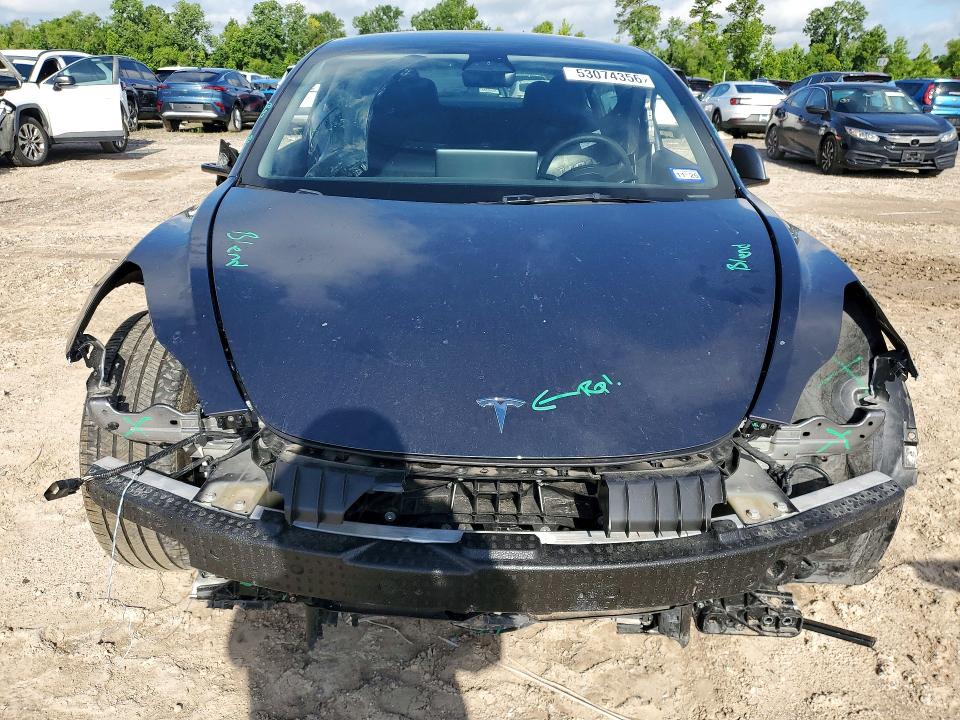 2023 Tesla VIN 5YJ3E1EA7PF672168 COPART salvage auction — FRONT END, Tx - Salvage Vehicle Title, sold $6,100 on 2026-07-07 (photo 5)