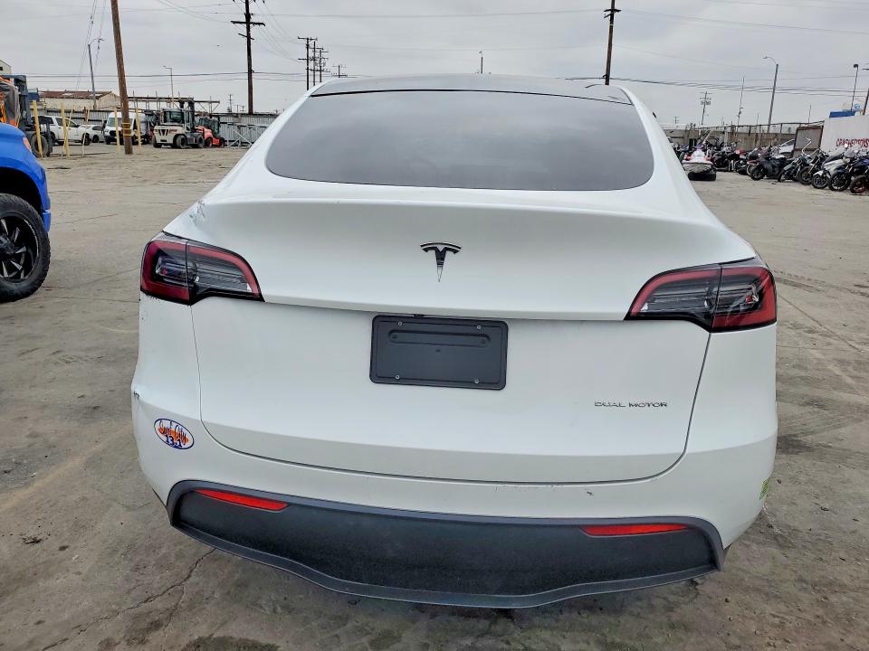 2023 Tesla Model y VIN 7SAYGAEEXPF742736 COPART salvage auction — SIDE, Ca - Salvage Certificate, sold $14,200 on 2026-07-29 (photo 6)