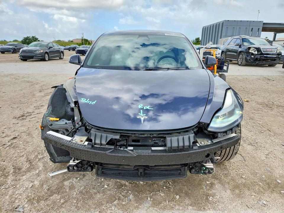 2021 Tesla Model 3 VIN 5YJ3E1EA1MF087839 COPART salvage auction — FRONT END, Fl - Cert Of Title Slvg Rebuildable, sold $8,700 on 2026-07-09 (photo 5)