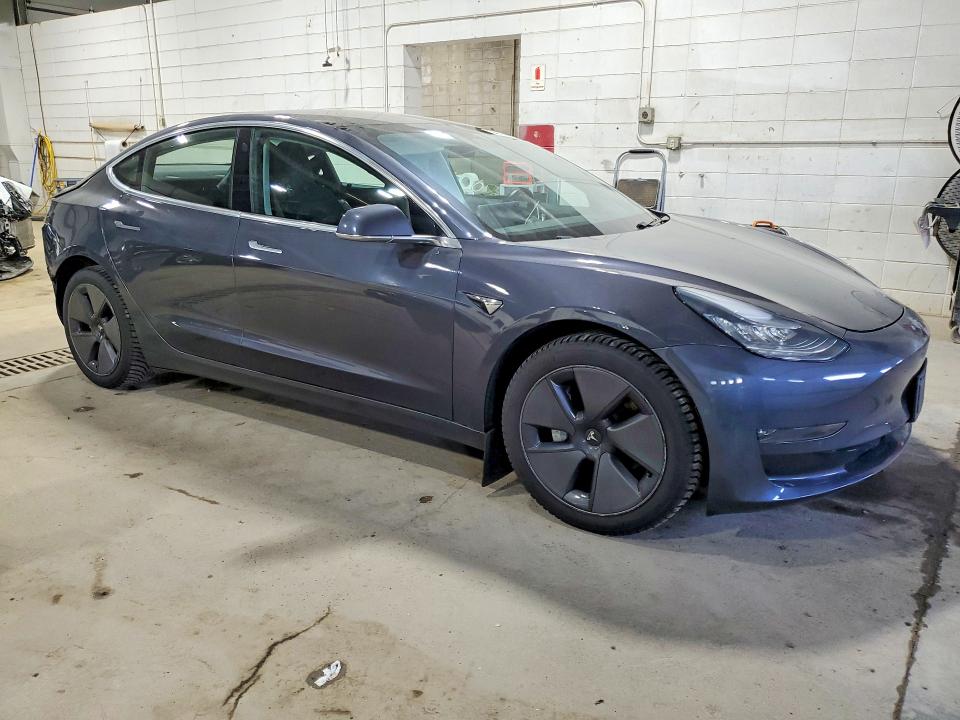 2018 Tesla Model 3 VIN 5YJ3E1EB3JF130422 COPART salvage auction — REAR END, Mn - Cert Of Title-Salvage, sold $5,500 on 2026-07-02 (photo 4)
