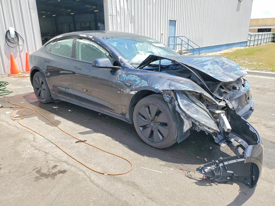 2024 Tesla Model 3 VIN 5YJ3E1EAXRF756164 COPART salvage auction — FRONT END, Fl - Certificate Of Title, sold $9,500 on 2026-07-09 (photo 4)