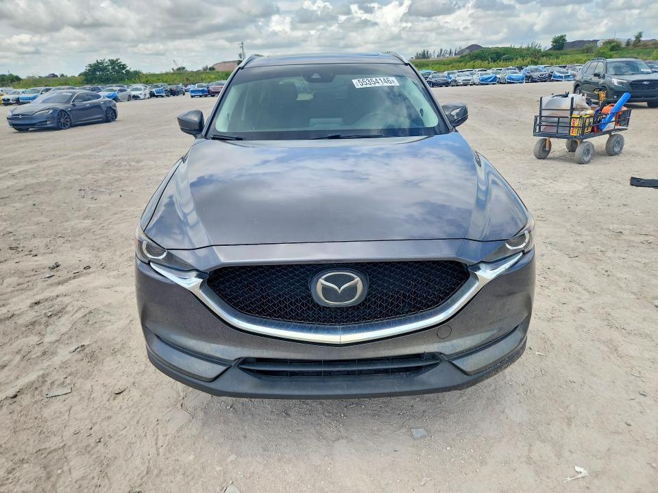 2020 Mazda Cx-5 VIN JM3KFACM7L1863038 COPART salvage auction — SIDE, Fl - Cert Of Title Slvg Rebuildable, sold $6,300 on 2026-07-16 (photo 5)