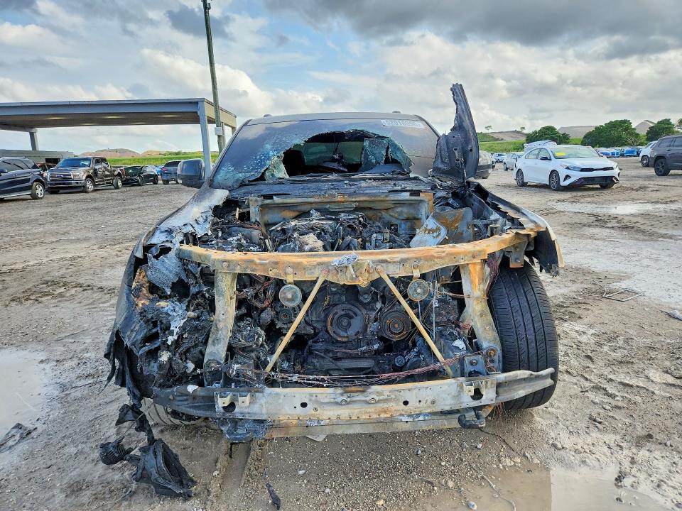 2018 Jeep Grand cherokee VIN 1C4RJFCM7JC421851 COPART salvage auction — ENGINE BURN, Fl - Cert Of Title Slvg Rebuildable, sold $425 on 2026-07-04 (photo 5)