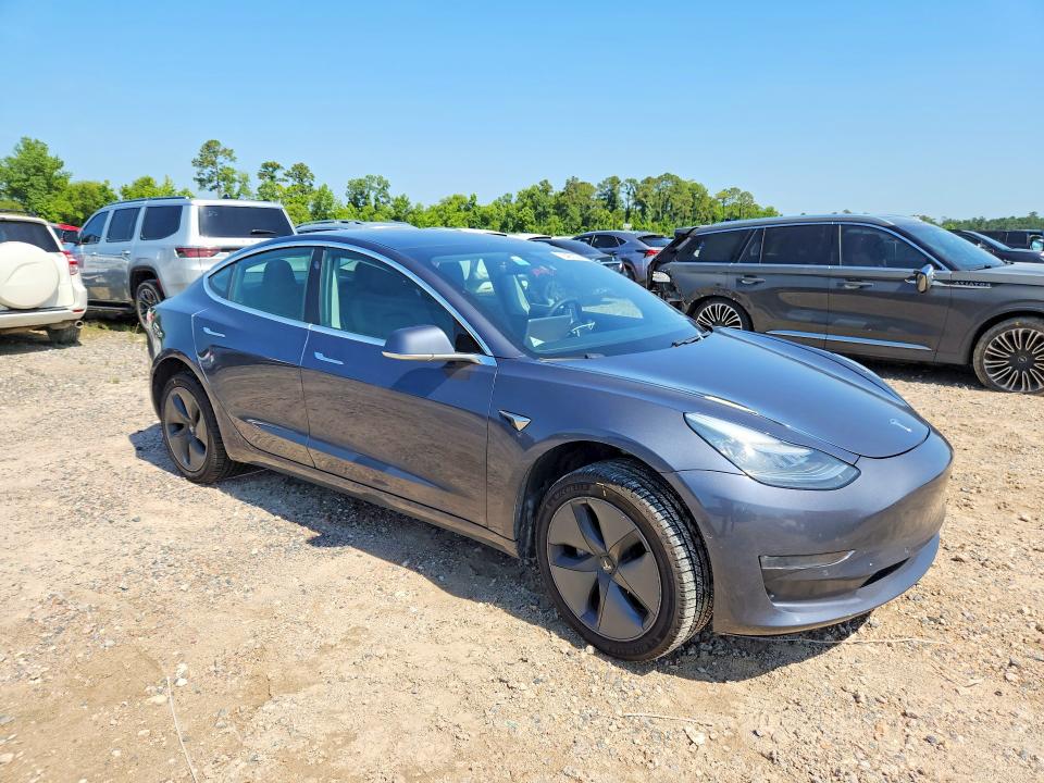 2020 Tesla VIN 5YJ3E1EB2LF534797 COPART salvage auction — WATER/FLOOD, Tx - Salvage Title-Flood Damage, sold $5,100 on 2026-07-07 (photo 4)