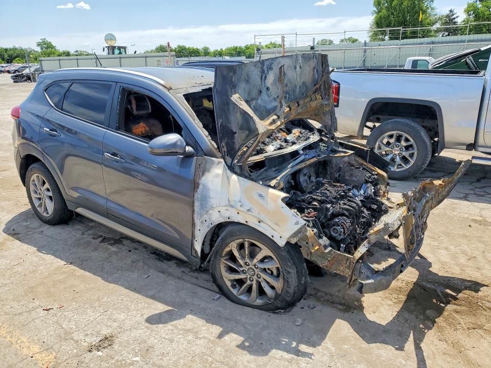 2017 Hyundai Tucson VIN KM8J3CA45HU281307 COPART salvage auction — ENGINE BURN, Tx - Salvage Vehicle Title, sold $400 on 2026-07-13 (photo 4)
