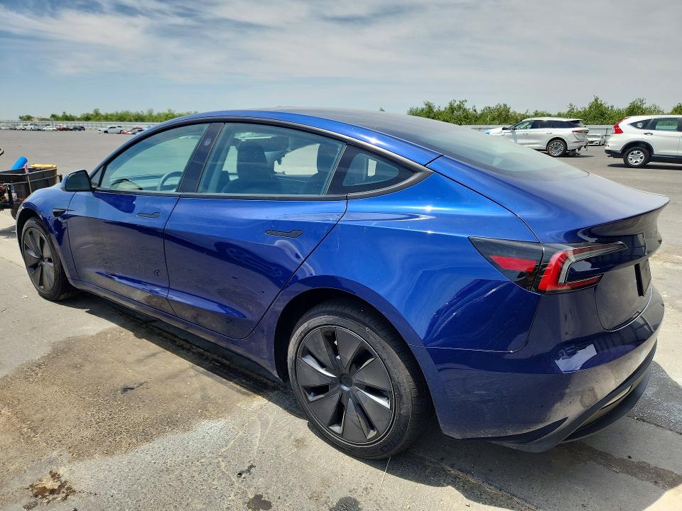 2025 Tesla Model 3 VIN 5YJ3E1EA4SF057005 COPART salvage auction — SIDE, Ca - Salvage Certificate, sold $11,300 on 2026-07-13 (photo 2)
