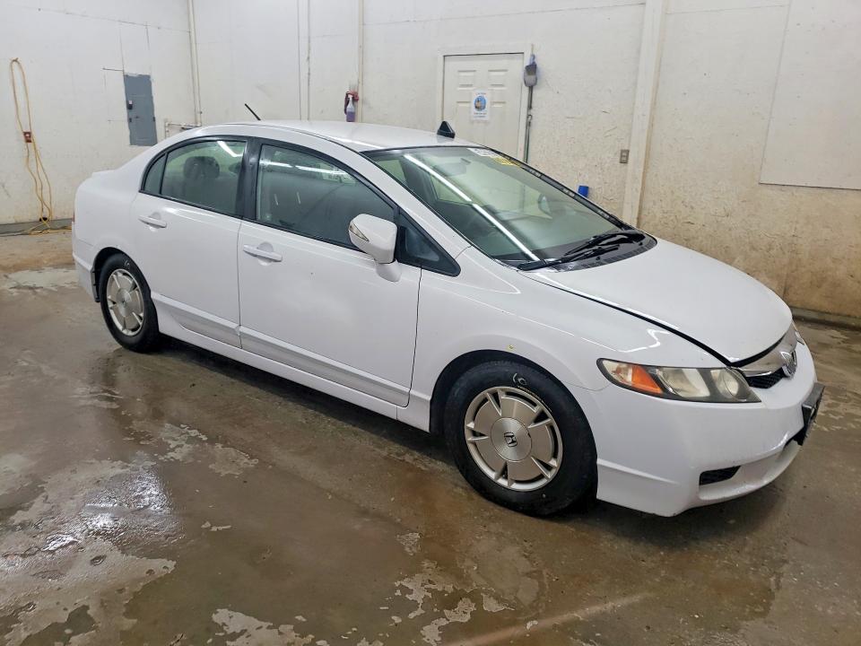 2011 Honda Civic hybrid VIN JHMFA3F26BS000110 COPART salvage auction — MINOR DENT/SCRATCHES, Tn - Certificate Of Title, sold $575 on 2026-07-07 (photo 4)