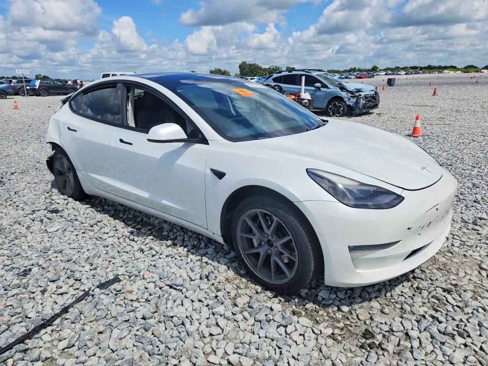 2022 Tesla Model 3 VIN 5YJ3E1EB0NF267758 COPART salvage auction — REAR END, FL - CERTIFICATE OF DESTRUCTION, sold $0 on 2026-09-16 (photo 4)