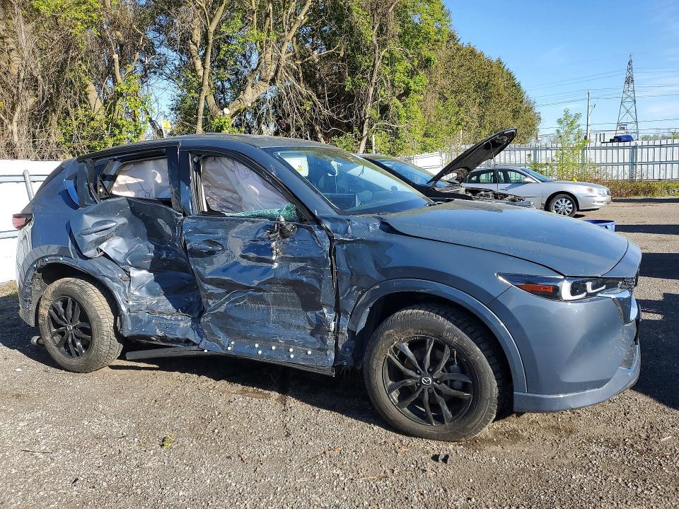 2025 Mazda Cx-5 VIN JM3KFBDM6S0571776 COPART salvage auction — ROLLOVER, On - Permit Irrepairable, sold $3,700 on 2026-07-09 (photo 4)