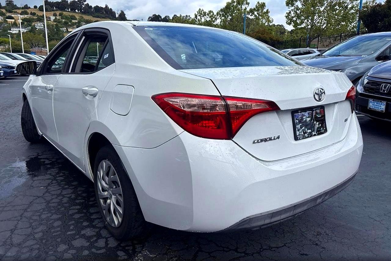 2018 Toyota Corolla VIN 5YFBURHE3JP840007 COPART salvage auction — Minor Dent/Scratches, CA - DIS/DLR/EXP ONLY CLEAN TITLE (P), sold $5,000 on 2026-06-18 (photo 3)