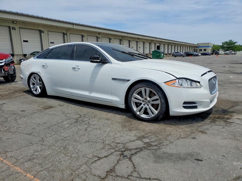 2013 Jaguar VIN SAJWA2G10DLV53383 COPART salvage auction — SIDE, Ky - Certificate Of Title, sold $575 on 2026-07-20 (photo 4)