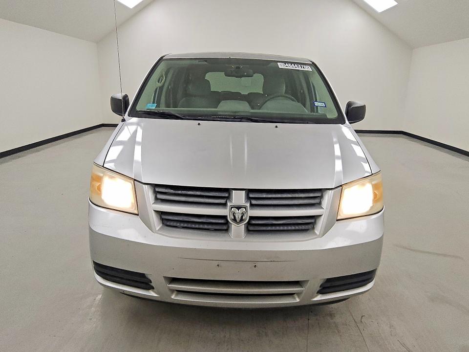 2010 Dodge Grand caravan VIN 2D4RN4DE4AR307669 COPART salvage auction — MINOR DENT/SCRATCHES, TX - CERTIFICATE OF TITLE, sold $100 on 2026-07-09 (photo 5)