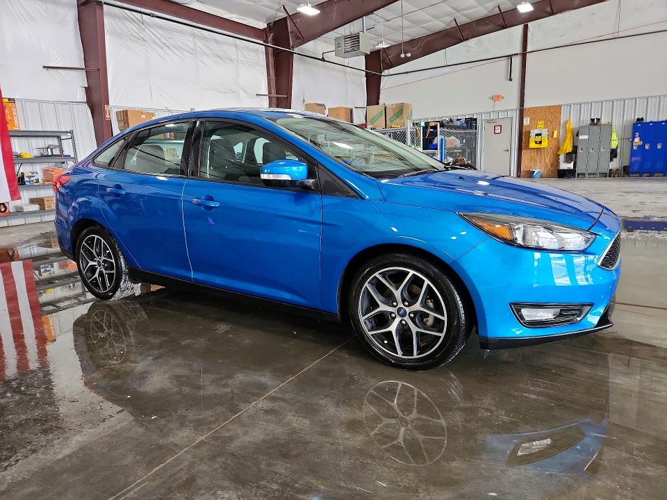 2017 Ford VIN 1FADP3H23HL245007 COPART salvage auction — HAIL, Il - Salvage Certificate, sold $3,100 on 2026-07-27 (photo 4)