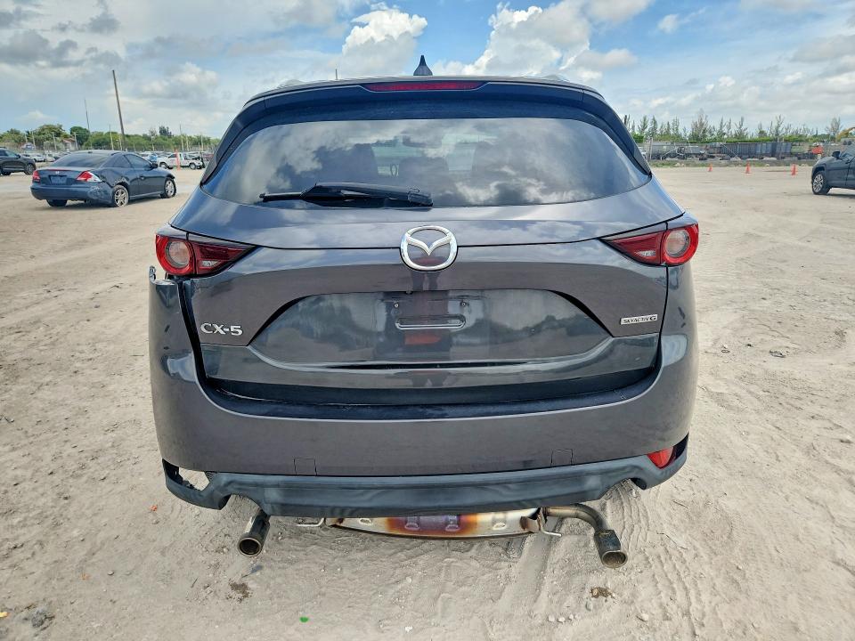 2020 Mazda Cx-5 VIN JM3KFACM7L1863038 COPART salvage auction — SIDE, Fl - Cert Of Title Slvg Rebuildable, sold $6,300 on 2026-07-16 (photo 6)