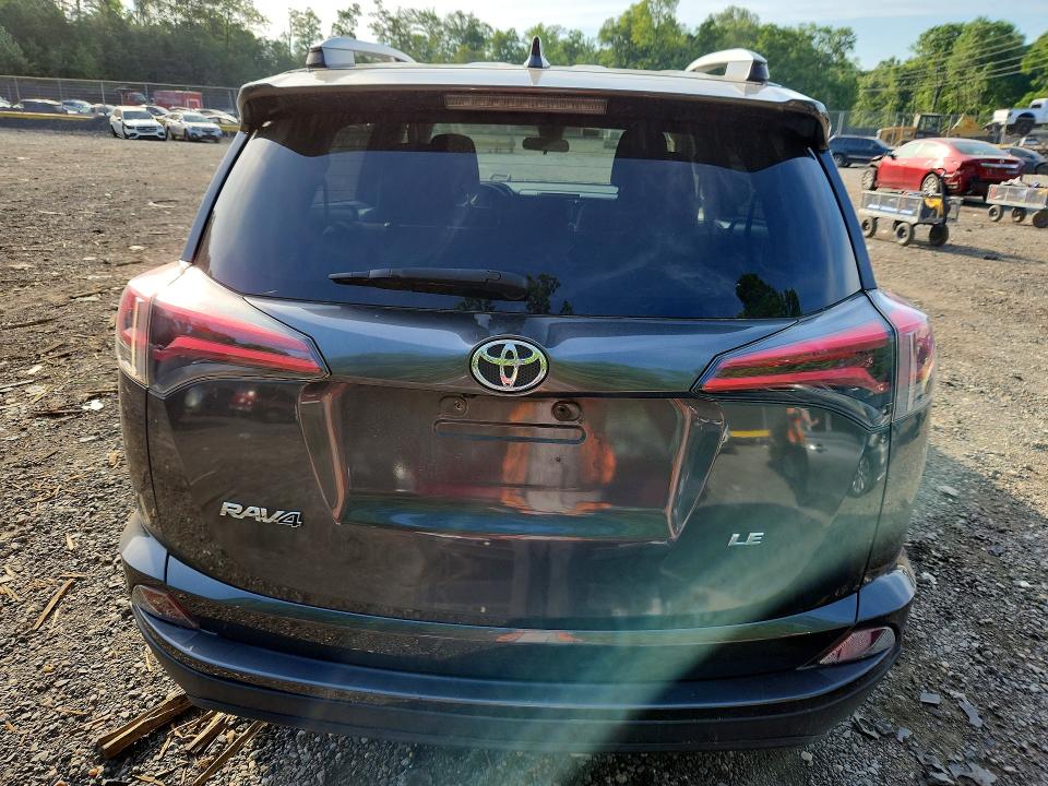 2017 Toyota Rav 4 VIN JTMZFREV7HJ711540 COPART salvage auction — SIDE, Md - Cert Of Salvage > 75% Damage, sold $3,950 on 2026-07-17 (photo 6)