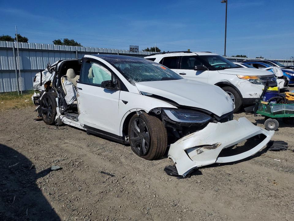 2026 Tesla Model x VIN 7SAXCDE57TF480340 COPART salvage auction — ROLLOVER, Ca - Non-Repairable Vehicle Cert, sold $2,800 on 2026-07-02 (photo 4)