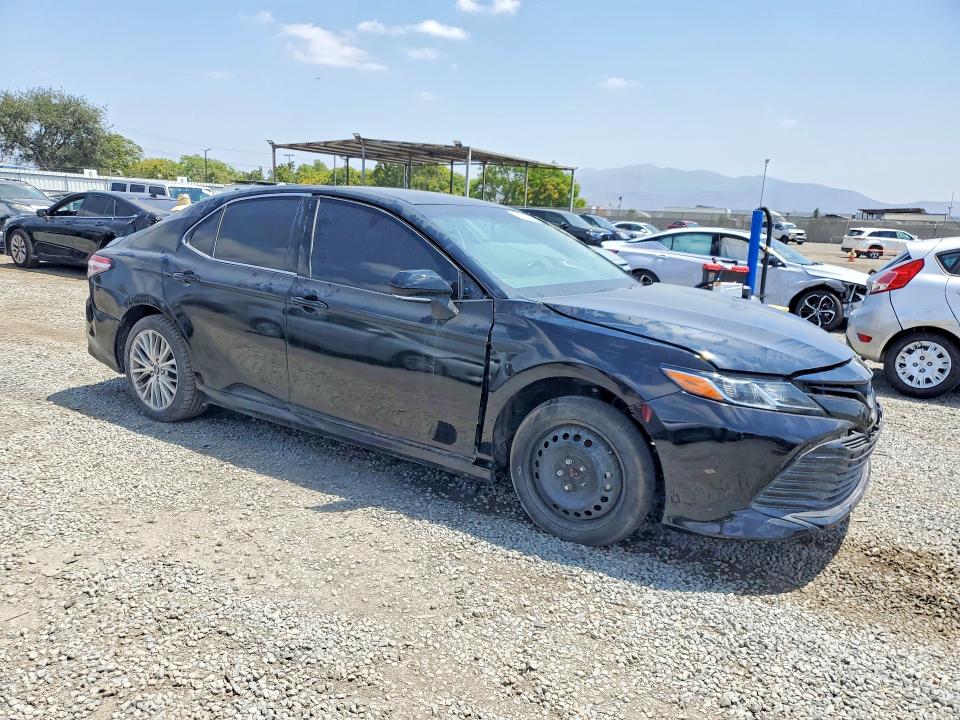 2019 Toyota Camry hybrid VIN 4T1B21HK7KU516393 COPART salvage auction — FRONT END, In - Dis/Dlr/Exp Only Clean Title, sold $10,800 on 2026-07-15 (photo 4)