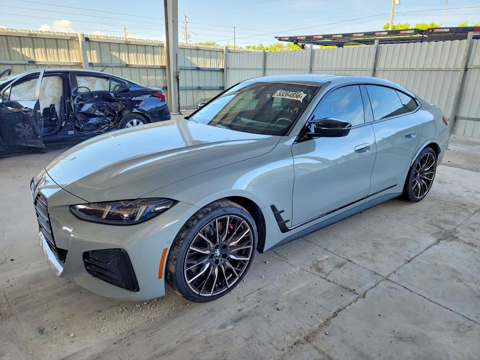 2025 BMW I4 VIN WBY33HD06SFT96110 COPART salvage auction — SIDE, Fl - Cert Of Title Slvg Rebuildable, sold $21,300 on 2026-07-22 (photo 1)