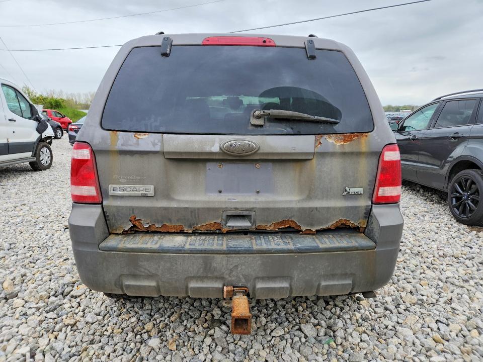 2011 Ford Escape VIN 1FMCU9DG6BKA21385 COPART salvage auction — WATER/FLOOD, MI - CERT OF TITLE-FLOOD VEHICLE, sold $200 on 2026-07-02 (photo 6)