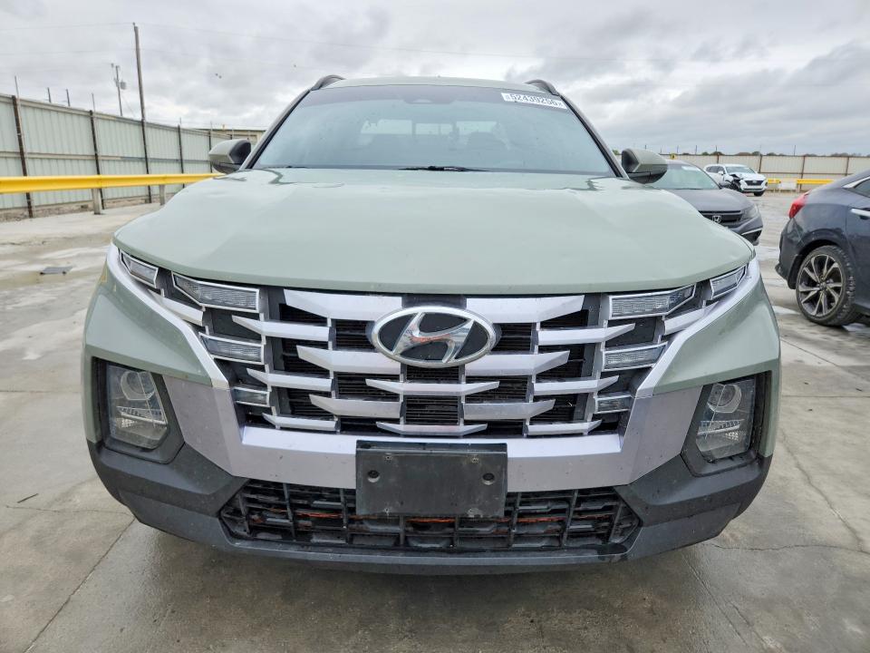 2022 Hyundai Santa cruz VIN 5NTJCDAE7NH030167 COPART salvage auction — HAIL, Tx - Certificate Of Title, sold $11,400 on 2026-07-14 (photo 5)