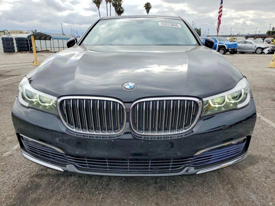 2016 BMW 7er VIN WBA7E2C52GG738741 COPART salvage auction — SIDE, Salvage Title, sold $8,100 on 2026-08-04 (photo 5)