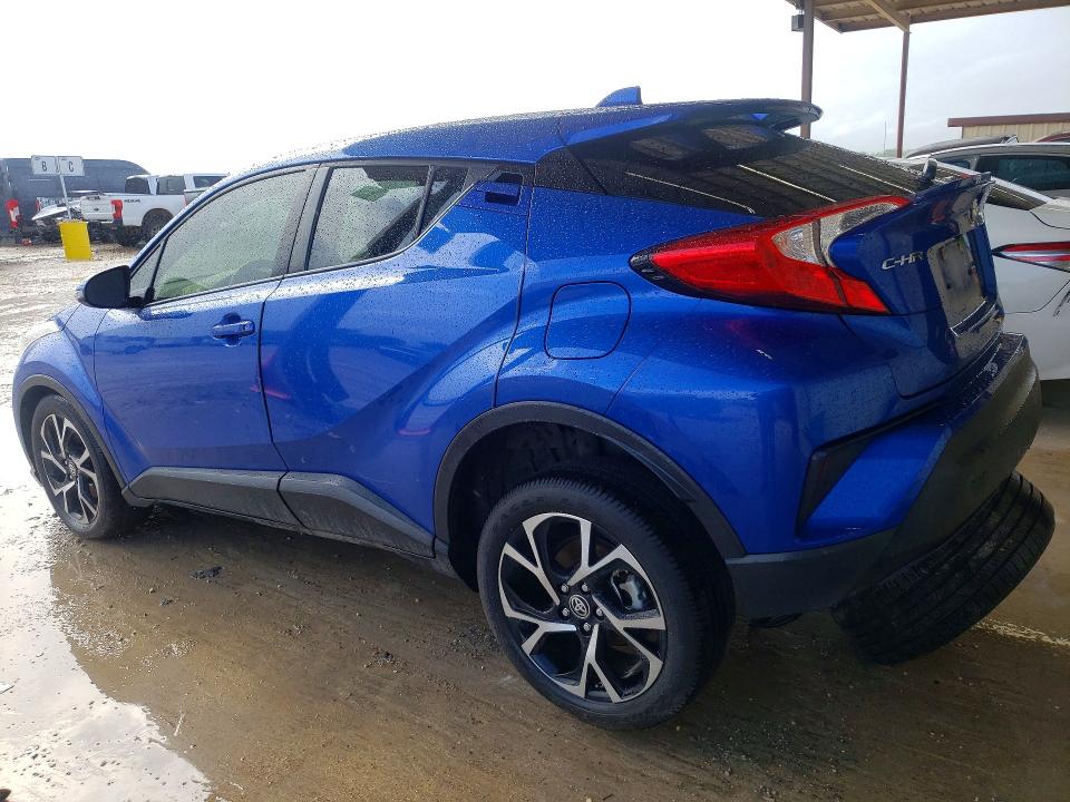 2021 Toyota C-hr VIN JTNKHMBXXM1116837 COPART salvage auction — SIDE, Tx - Salvage Vehicle Title, sold $3,500 on 2026-07-16 (photo 2)