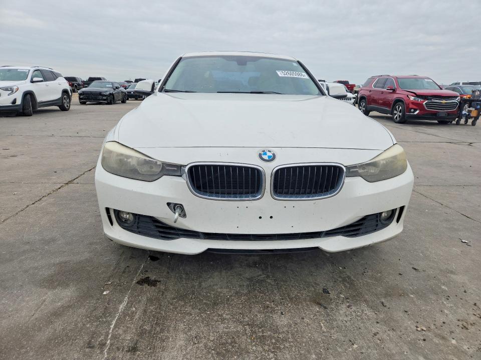 2014 BMW 3 series VIN WBA3C1C59EK116291 COPART salvage auction — WATER/FLOOD, TX - SALVAGE TITLE-FLOOD DAMAGE, sold $550 on 2026-07-16 (photo 5)