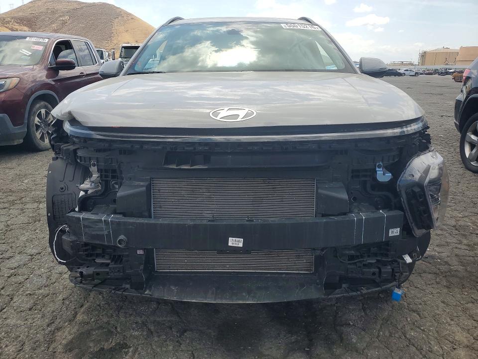2025 Hyundai Kona VIN KM8HBCAB6SU305976 COPART salvage auction — FRONT END, Ca - Dis/Dlr/Exp Only Clean Title (P), sold $4,250 on 2026-07-30 (photo 5)