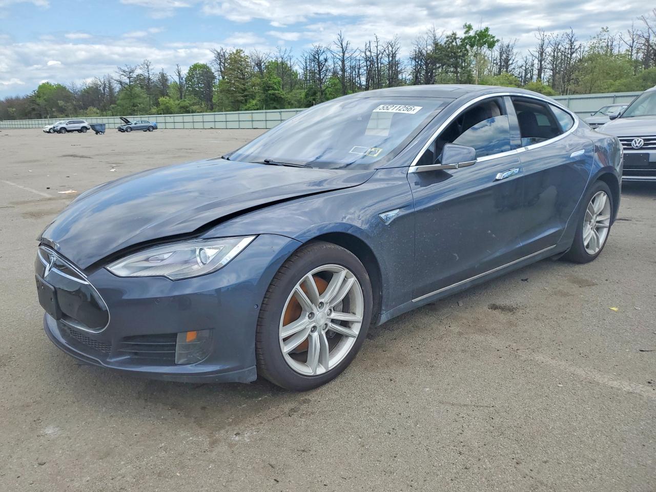 2015 Tesla Model S VIN 5YJSA1E11FF116590 — COPART salvage auction photo