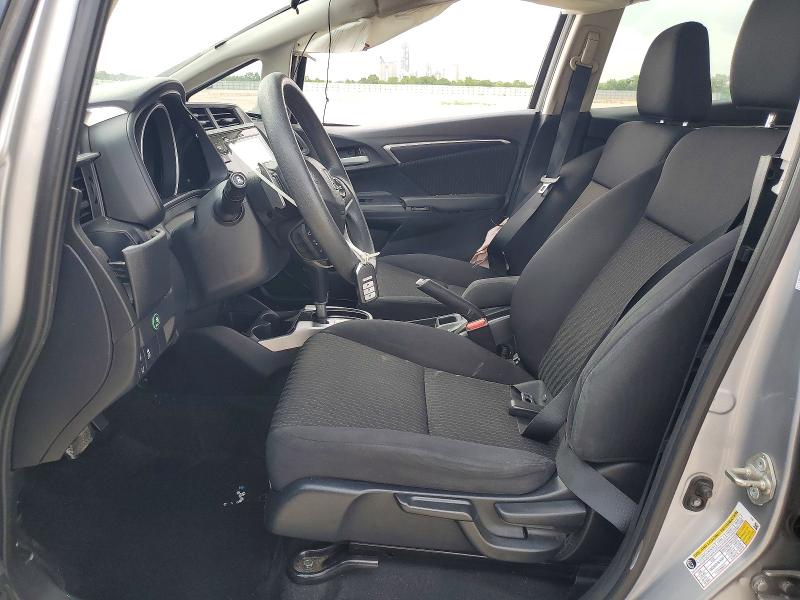 2018 Honda Fit VIN 3HGGK5H89JM717996 COPART salvage auction — SIDE, Tx - Salvage Vehicle Title, sold $2,000 on 2026-07-09 (photo 7)