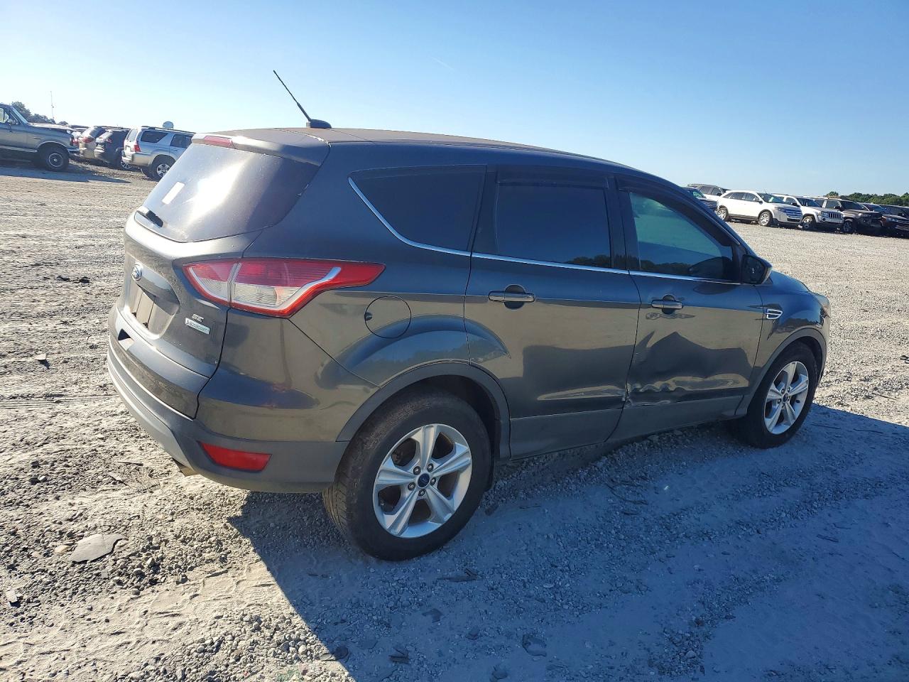 2015 Ford Escape VIN 1FMCU0GX3FUA98961 COPART salvage auction — Side, GA - CERT OF TITLE-COURT ORDER, sold $2,300 on 2026-07-06 (photo 3)