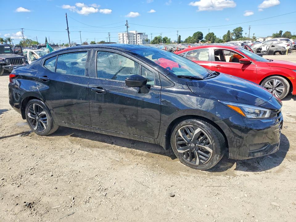 2024 Nissan Versa VIN 3N1CN8FV2RL843961 COPART salvage auction — SIDE, Ca - Dis/Dlr/Exp Only Clean Title (P), sold $3,000 on 2026-09-02 (photo 4)