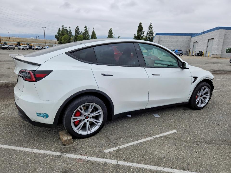 2024 Tesla Model y VIN 7SAYGDEE9RF075162 COPART salvage auction — SIDE, CA - SALVAGE CERTIFICATE, sold $150 on 2026-07-21 (photo 3)