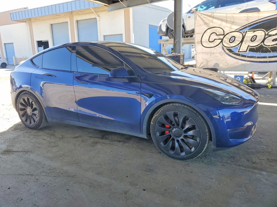 2023 Tesla Model y VIN 7SAYGDEF3PF906287 COPART salvage auction — REAR END, Ca - Salvage Certificate, sold $13,500 on 2026-07-02 (photo 4)