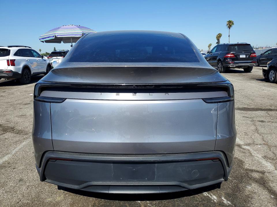2026 Tesla Model y VIN 7SAYGDED7TF416136 COPART salvage auction — SIDE, Ca - Salvage Certificate, sold $18,000 on 2026-07-17 (photo 6)