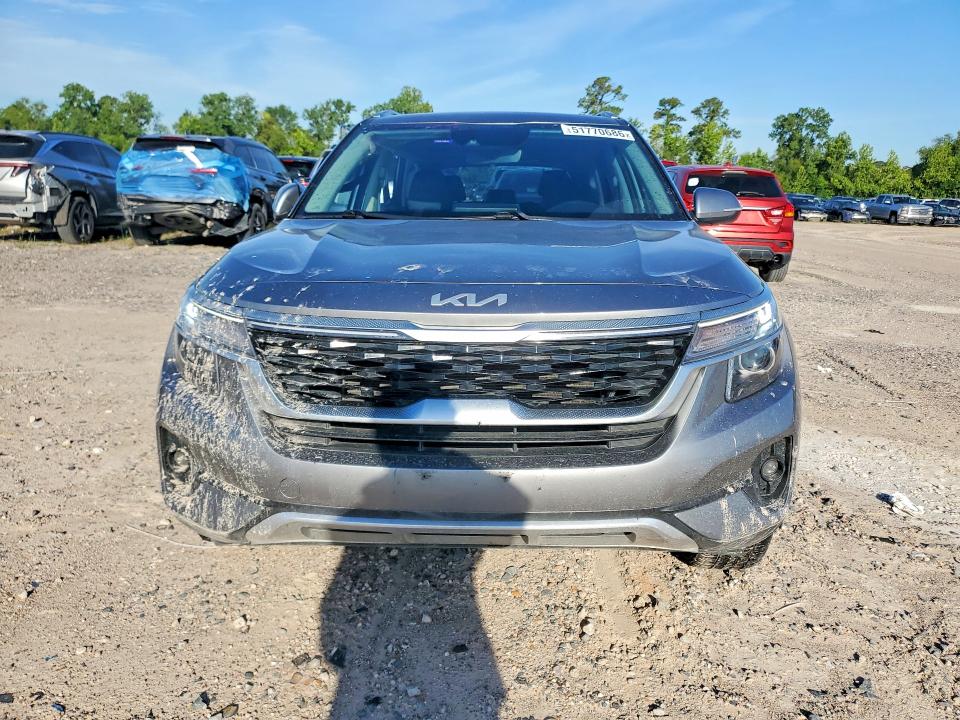 2023 Kia Seltos VIN KNDEU2AA2P7392106 COPART salvage auction — SIDE, Tx - Salvage Vehicle Title, sold $3,400 on 2026-07-21 (photo 5)